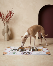 Italian Greyhound eating beside the Iggy Grey food mat