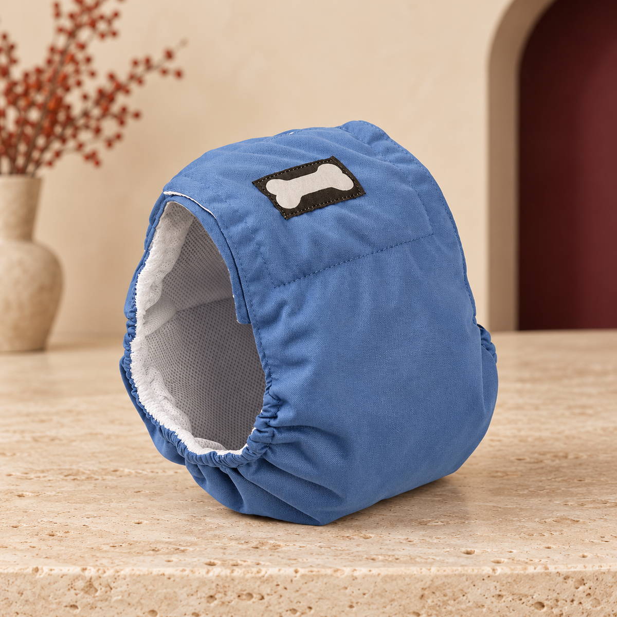 Blue male dog belly band with pale mesh lining