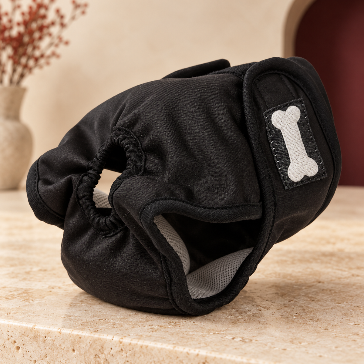 Black hygiene pants with elastic openings and hook-and-loop closure