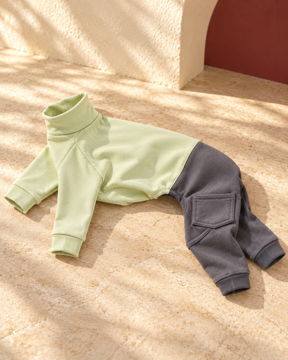 Panelled Four-Leg Iggy Onesie in Soft Green, garment detail
